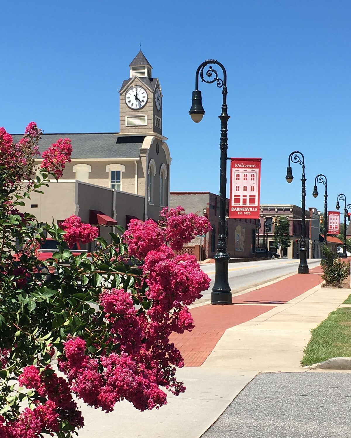 Downtown Barnesville with clock tower and Welcome banners